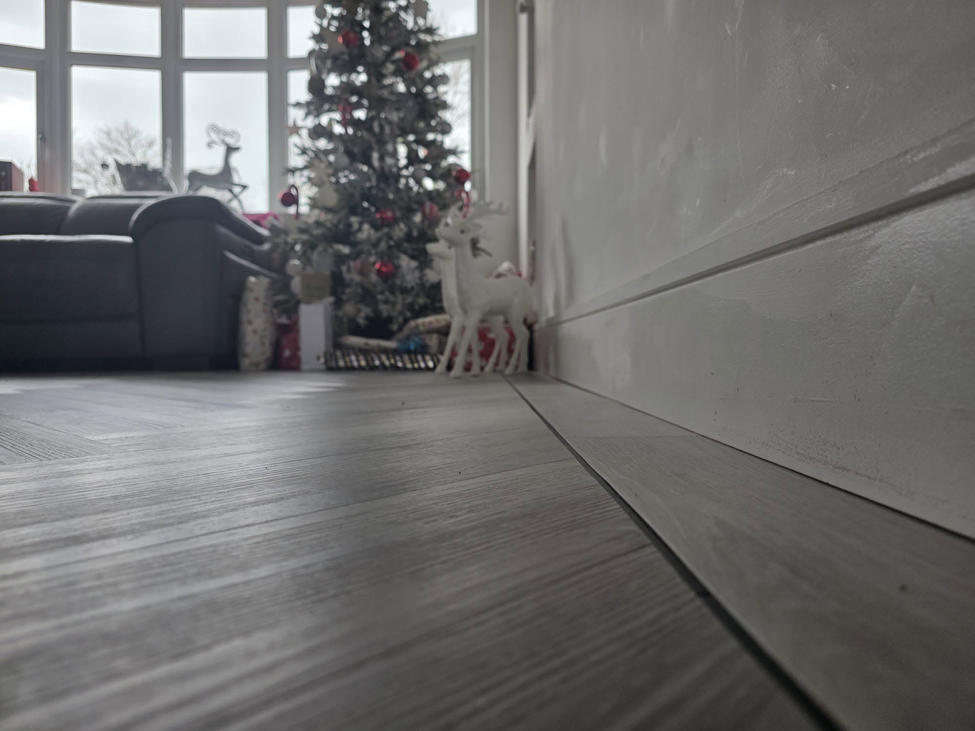 Grey herringbone LVT with straight edge border fitted in Ainsdale Southport by Ace Floors