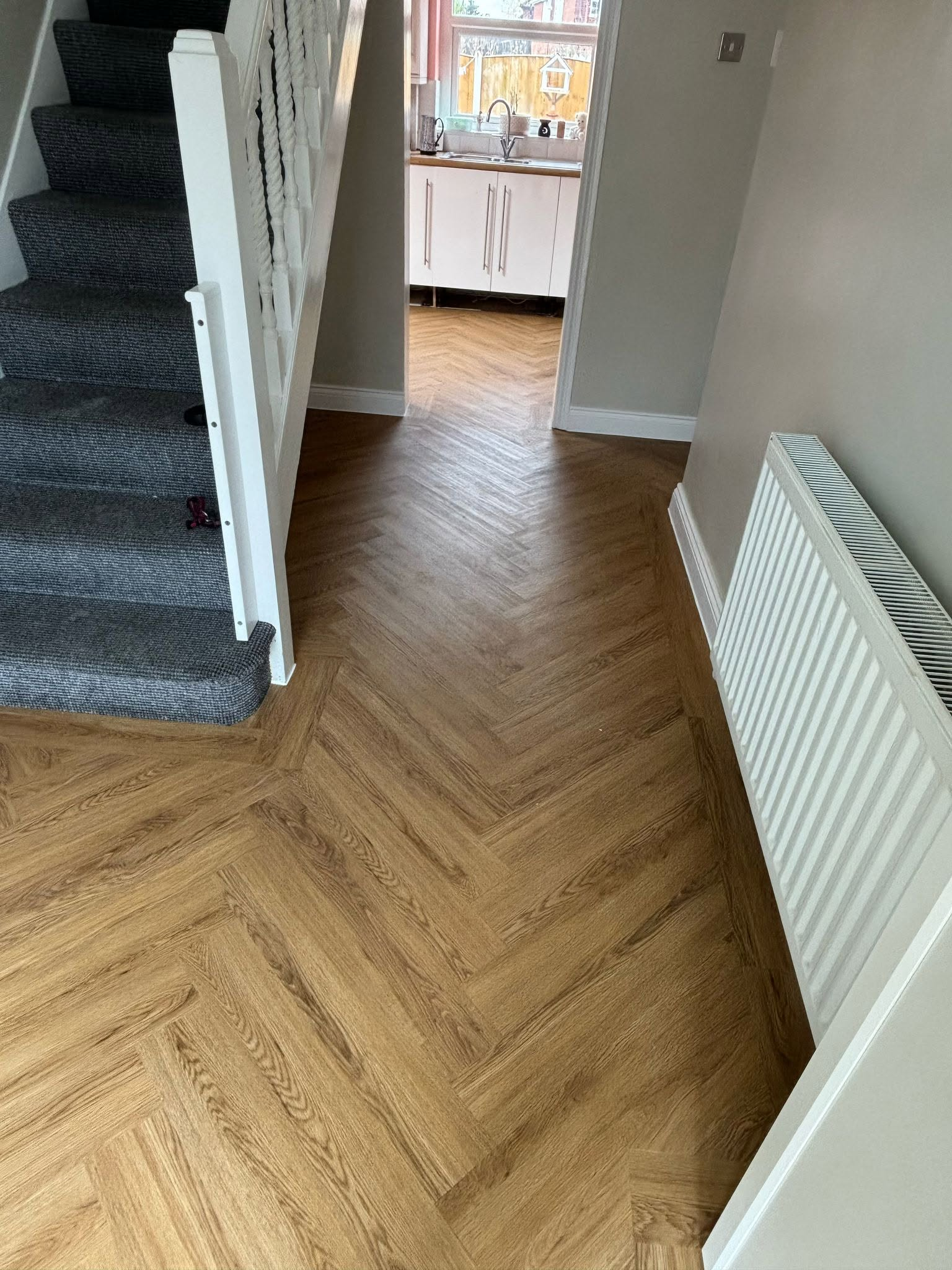 LVT herringbone flooring fitted in a local home